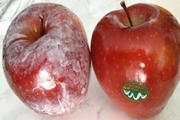 Why is apple fruit cracking a problem?