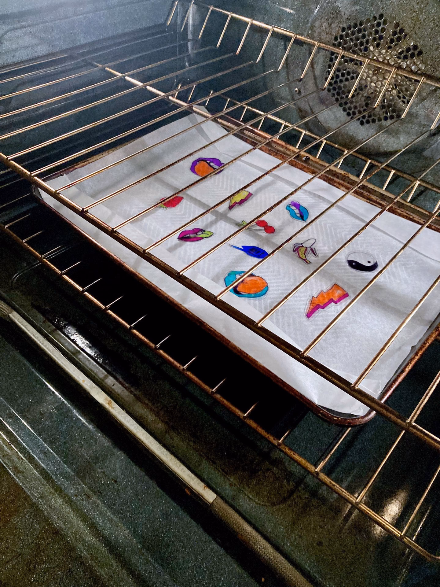 What happens if you cook Shrinky Dinks in the oven?