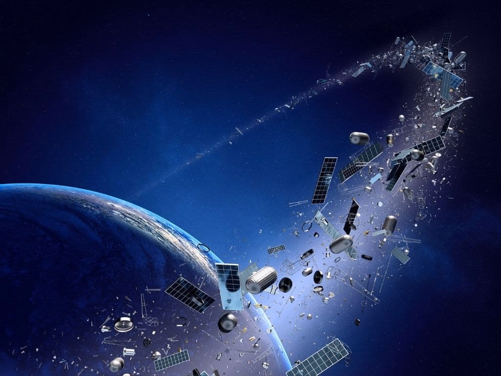 What are the environmental risks of space debris?